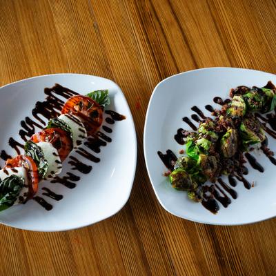 Caprese salad and Brussels sprouts.