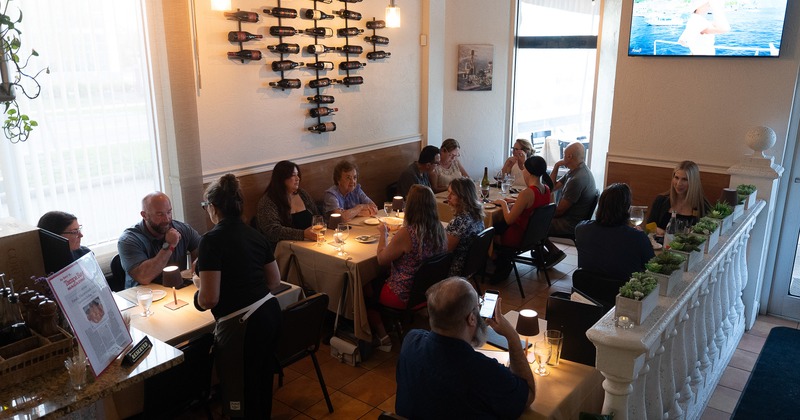 Cozy interior dining area full of guests enjoying their food