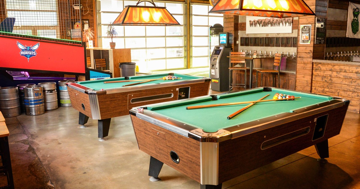 Two pool tables waiting for the players