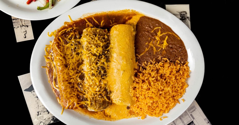 3 smothered burritos, served with rice and beans