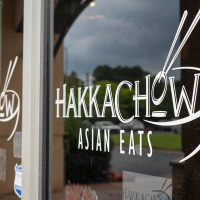 The restaurant's name in the window.