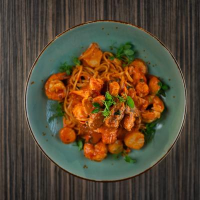 Spicy lobster pasta with shrimp and scallops.
