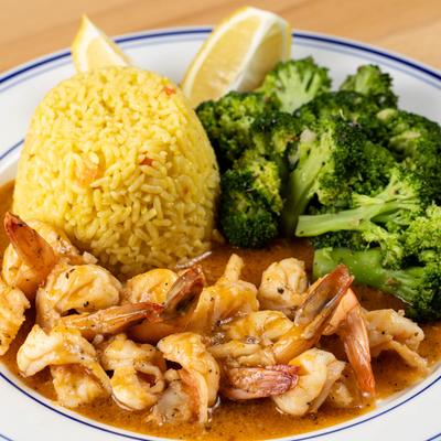 Shrimp in spicy sauce, with broccoli and rice.