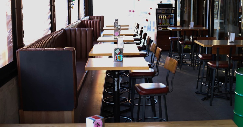 Interior, tables, chairs and high back benches