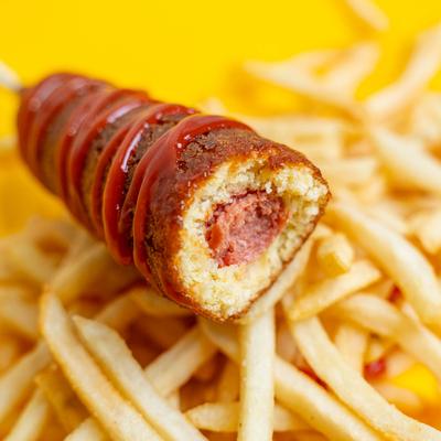 A corndog and fries.