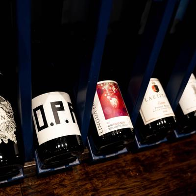 Assorted wine bottles.