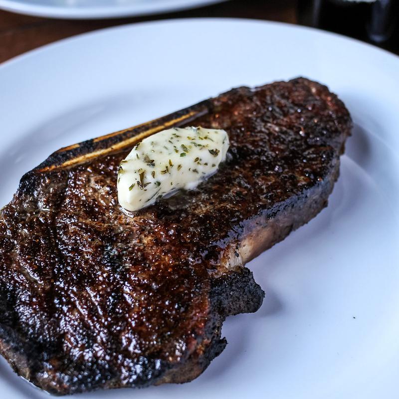 18 Ounce 40 day Bone-In Kansas City Strip* photo