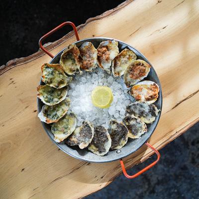 Oysters topped with bacon, Parmesan, bread crumbs and spinach
