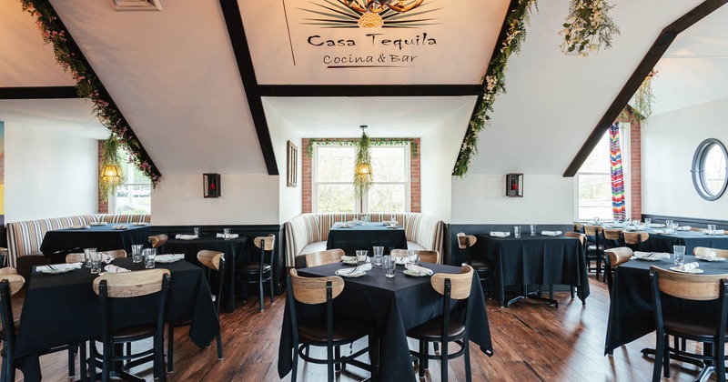 Interior, diner area, tables and chairs, wall decoration