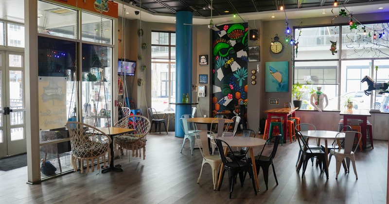 Interior, seating area with expressive pictures on the walls