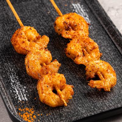 Seasoned shrimp skewers.