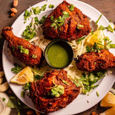 Tandoori Fried Chicken served with a green sauce