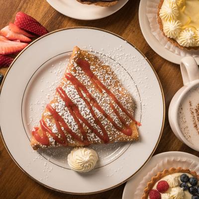 Strawberry and lemon curd crepe.
