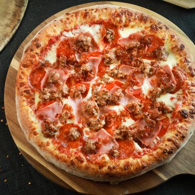 A top view of the mega meat pizza.