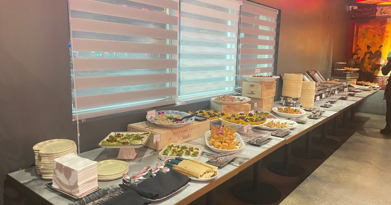 Half Room Buy out with open bar and buffet setup, able to accommodate up to 100 guests.