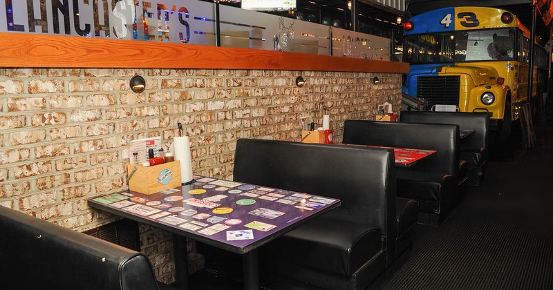 Interior, dining booths by a wall