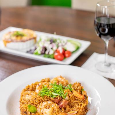 Jambalaya plate with red wine