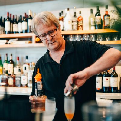Bartender making cocktails.