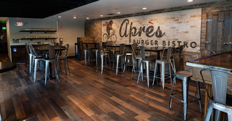 Interior, tables, chairs, sign on the wall