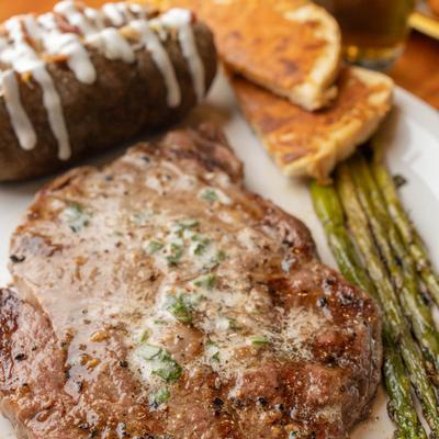 Grilled ribeye, with garlic butter.