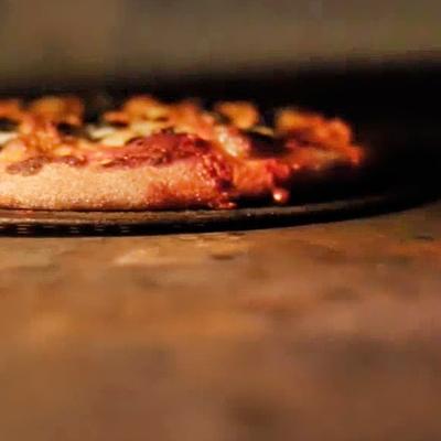 A pizza in the oven.