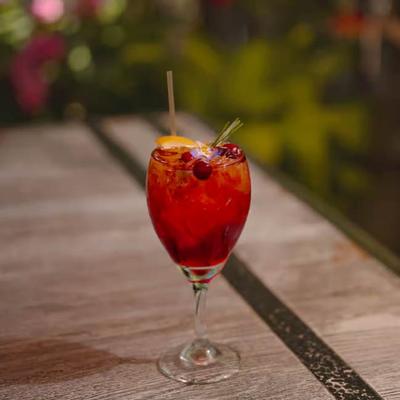 Pomegranate Spritz served outdoors.