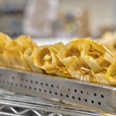 Tamales in a tray.