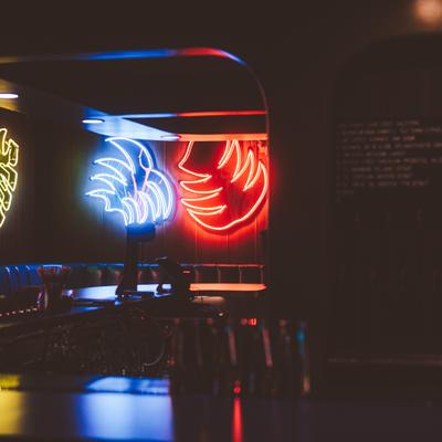 Seating area with leaf shaped neon lights