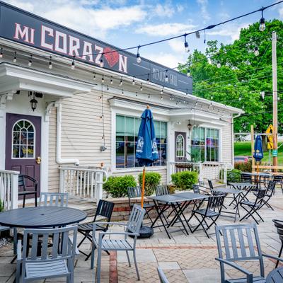 Exterior, tables and chairs ready for guests.