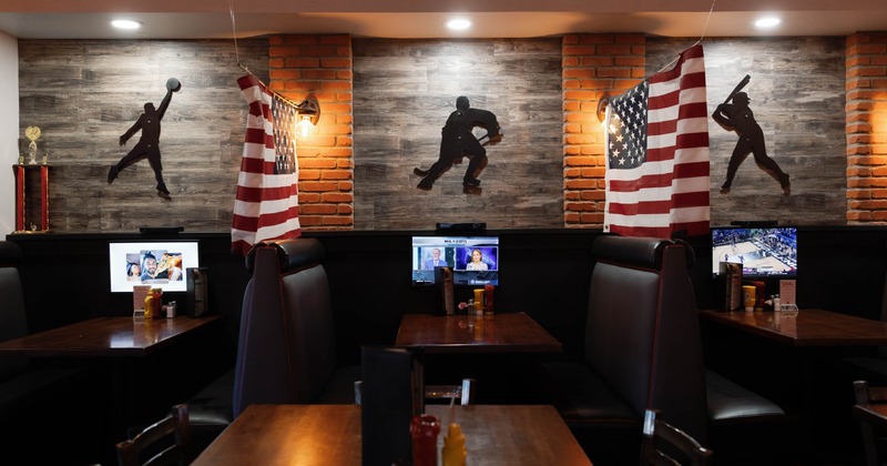 Interior, seating area with  booths and tables