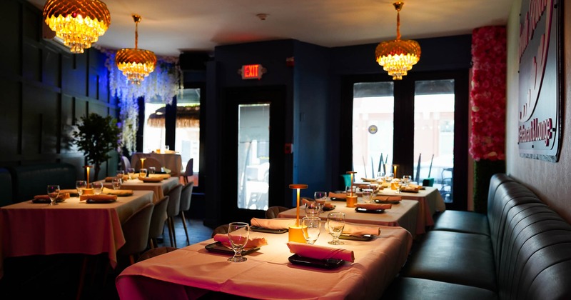 Interior, bench seating, tables ready for guests