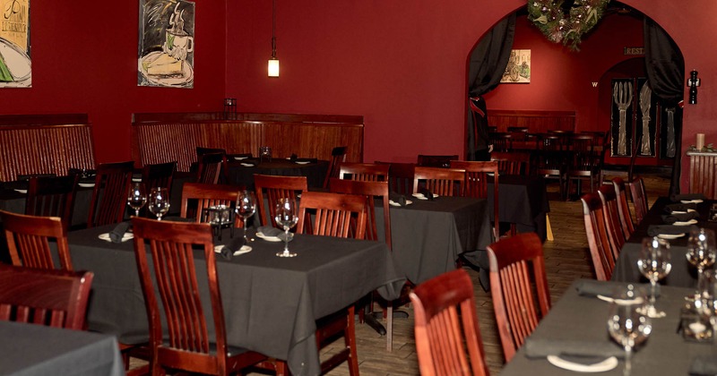 Interior, tables and chairs in dining area