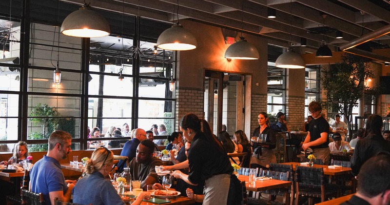 Interior, main dining area filled with guests