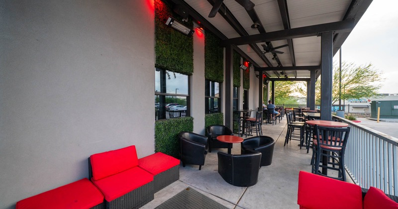 Exterior, patio, high and regular seating, ceiling fans, concrete flooring, metal railing