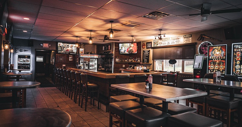 Interior, seating area with a bar in the back
