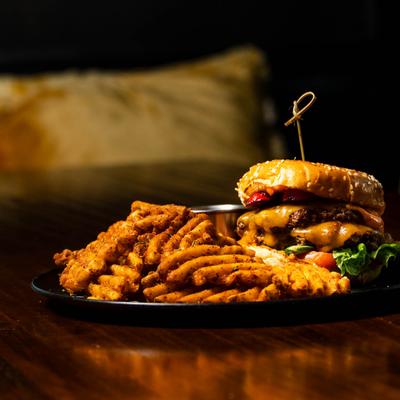 Cheeseburger with waffle fries.