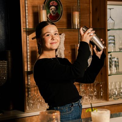Bartender shaking a cocktail.