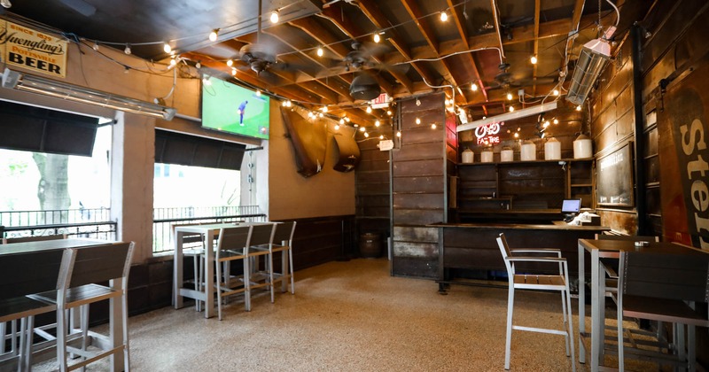 Interior, seating area with a bar in the back