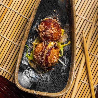 Ball shaped snack, stuffed with octopus.