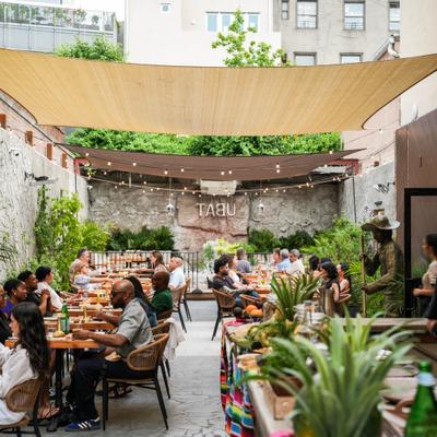 Guests seated in the outdoor patio dining area