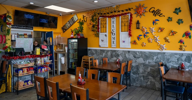 Dining area with decor on the wall