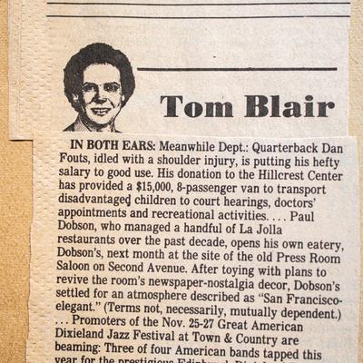 An old newspaper clipping featuring a headshot of Tom Blair and an article below