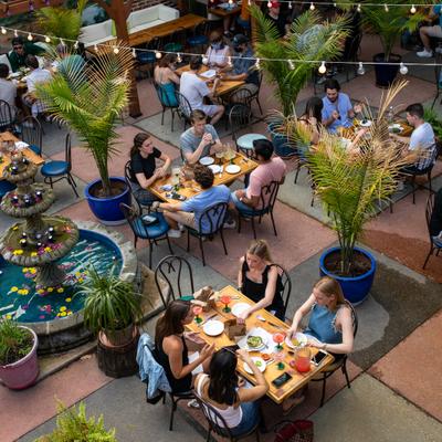 Overhead view of the seating area, customers eating and drinking