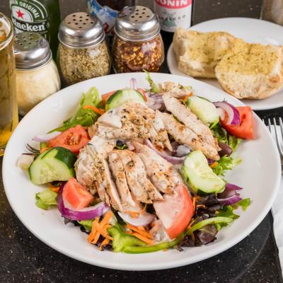 Grilled Chicken Souvlaki Salad (GF), grilled fresh chicken souvlaki on a garden salad with your choice of provolone or feta