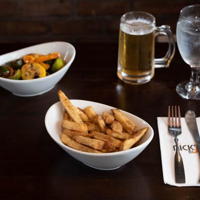 Fries, grilled vegetables and beer.