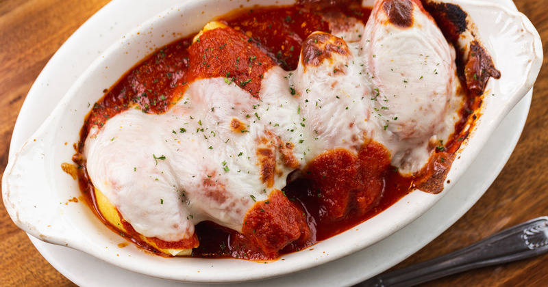 Meat with tomato sauce and dip on top