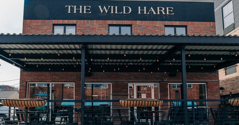 Exterior, patio with tables and chairs