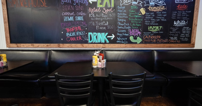 Banquette seating, chalkboard menu