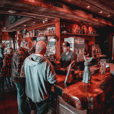 Customers at the bar.