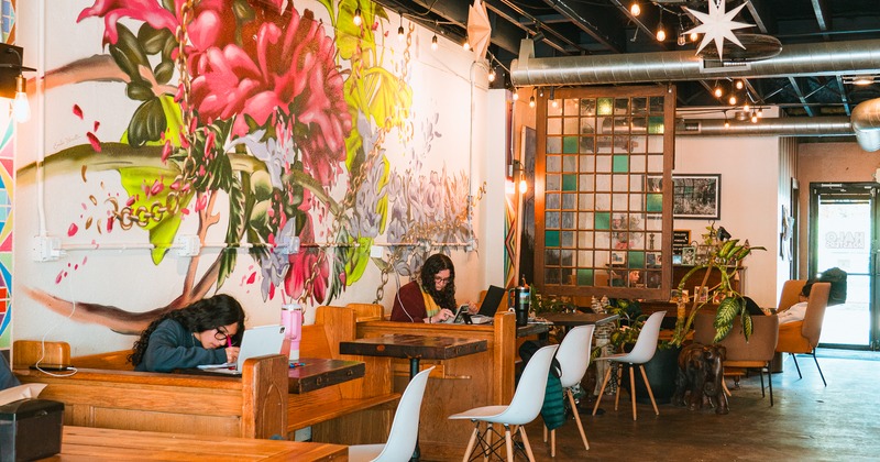 Interior, booths with wooden benches and chairs